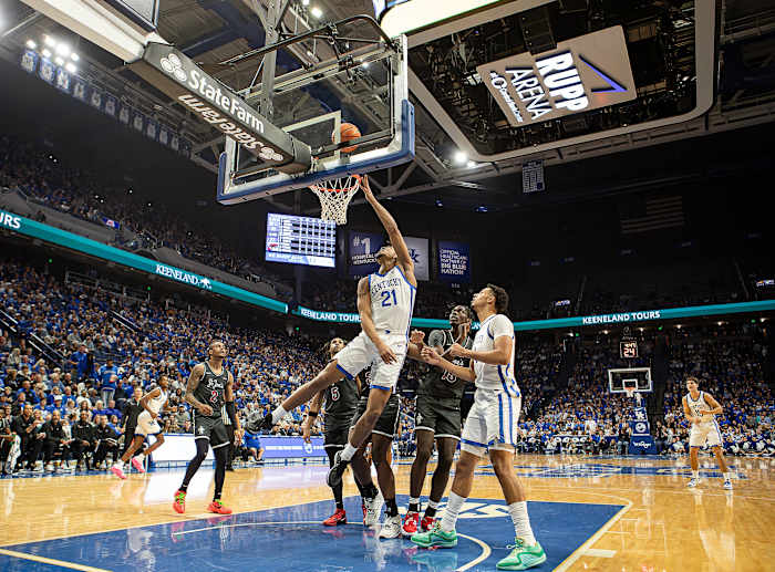 Kentucky's D.J. Wagner (21) scored the basket during first half action as the Wildcats took on the St. Joseph's Hawks at Rupp Arena on Monday, Nov. 20, 2023.